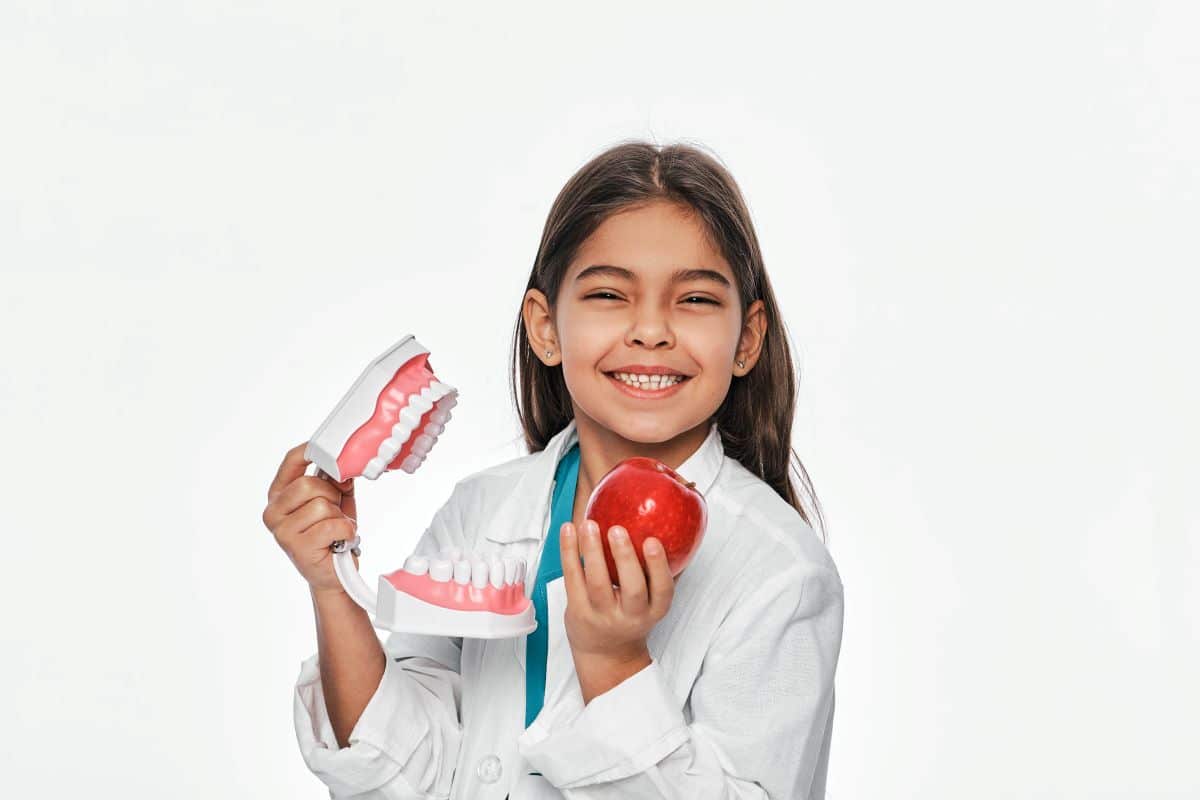 Little Girl Learning About Healthy Foods & Dental Care in San Francisco, California
